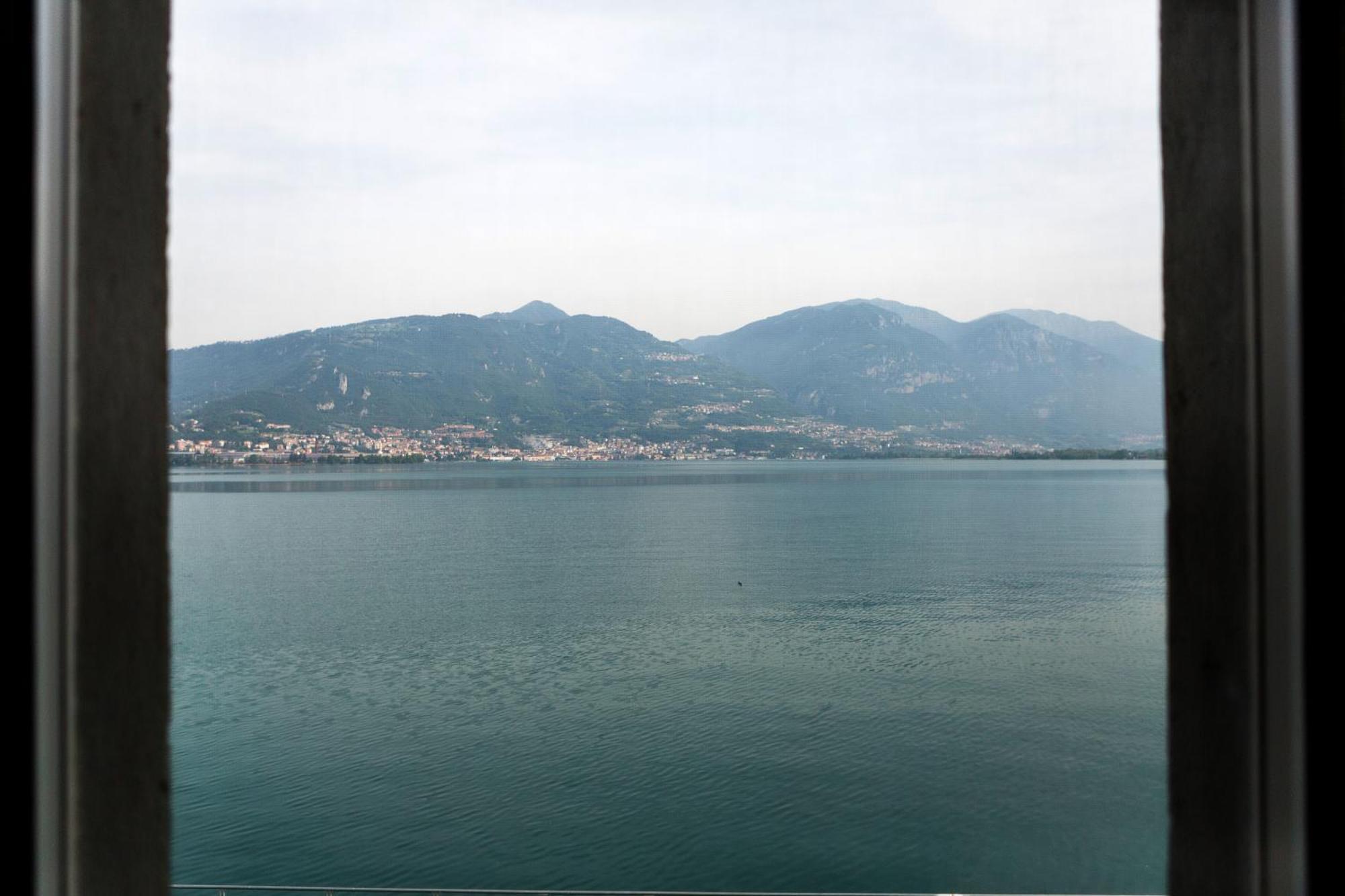 פיזונייה Lakefront Home Residenza Il Gallo In Riva Al Lago מראה חיצוני תמונה